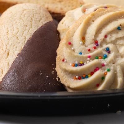 A plate with various cookies, close up.