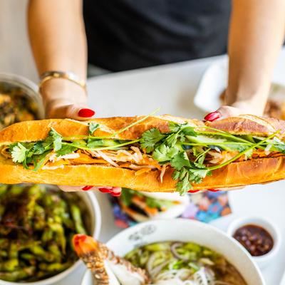 Grilled Pork Bahn Mi  in hands