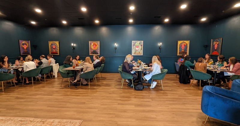 Interior, dining area with a wine rack