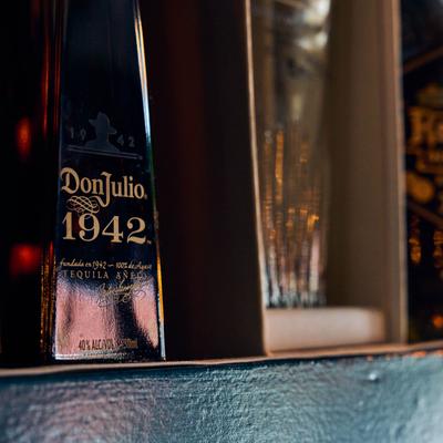 Liquor bottles displayed on a shelf.