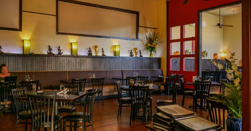 Interior, wide view, tables and chairs ready for guests