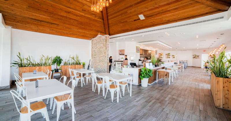 Interior, tables and chairs ready for guests