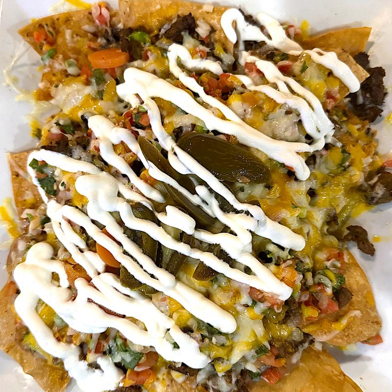 menu item 21 of 122, Nachos Steak Supremos