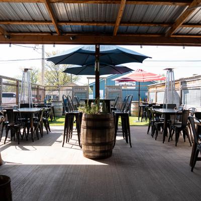 Covered patio, seating area.