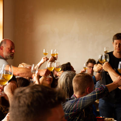Gaumarjos!  A winemaker toasts his guest at a supra (traditional Georgian feast) in Georgia.