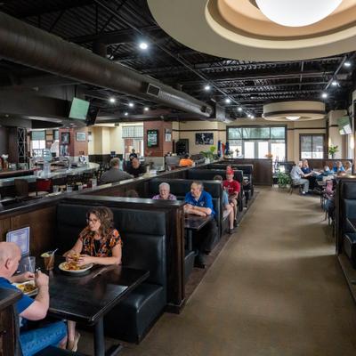 Customers eating and drinking.