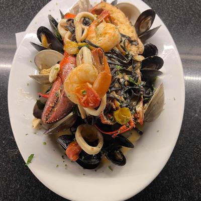 Seafood pasta with mussels, shrimp, clams, and calamari.