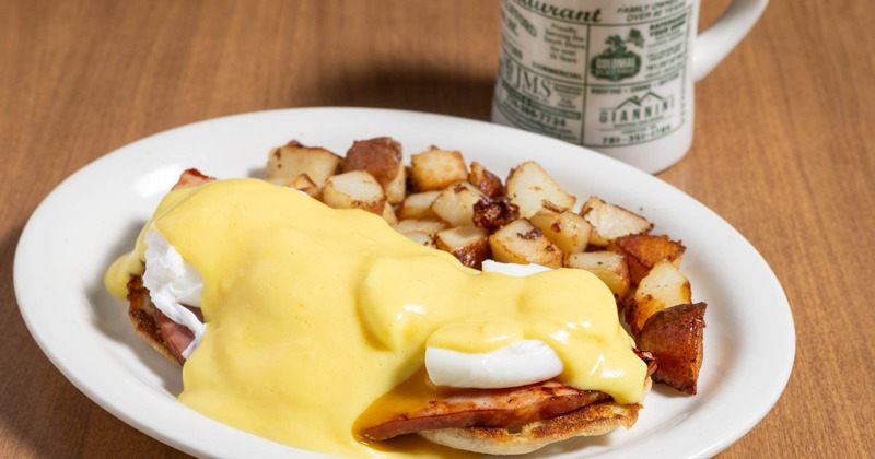 Eggs Benedict with breakfast potatoes