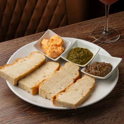 Homemade Focaccia served with three dips.