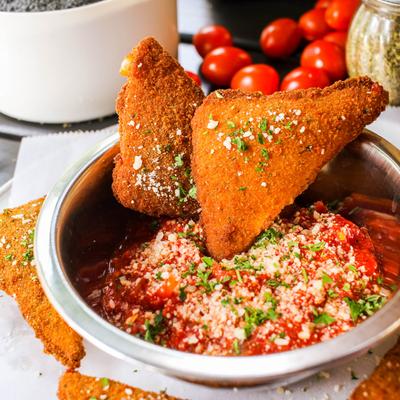 Fried cheese wedges with marinara sauce