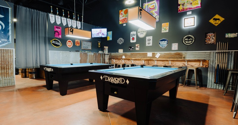 Interior, game area with billiard pool tables