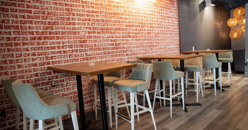 Interior, bar stools and tall tables