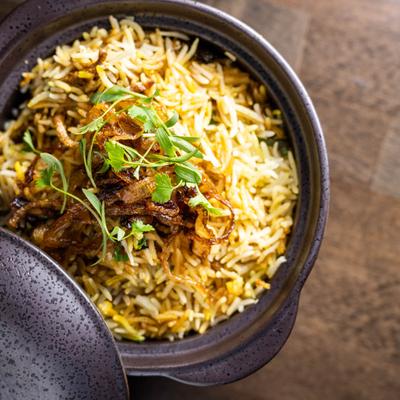 Fried before cooking rice served with lamb, top view