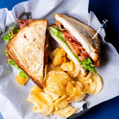 Applewood BLT sandwich and potato chips.