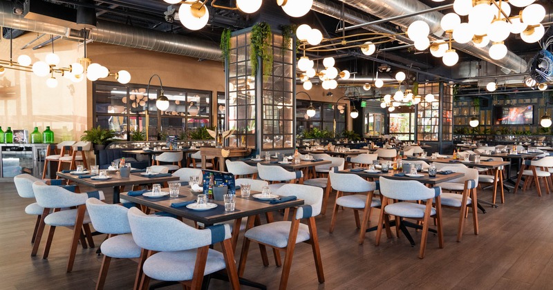 Interior dining area, tables set and ready for guests