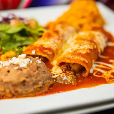 Rolled pastry, sauce and dip on the side