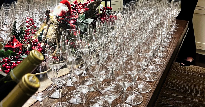 Numerous wine glasses prepared for service
