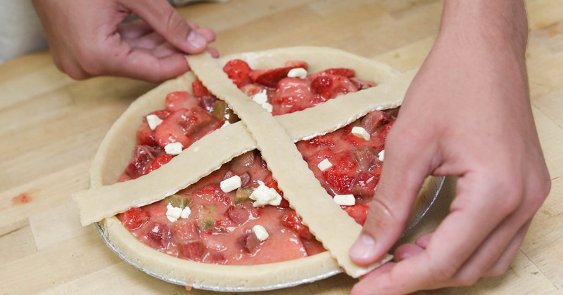Weaving pie dough to create lattice crust