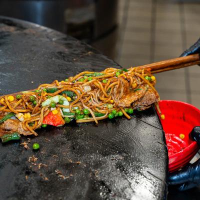 Cooking a noodle dish.