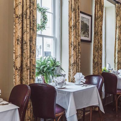 Fully set dining tables.