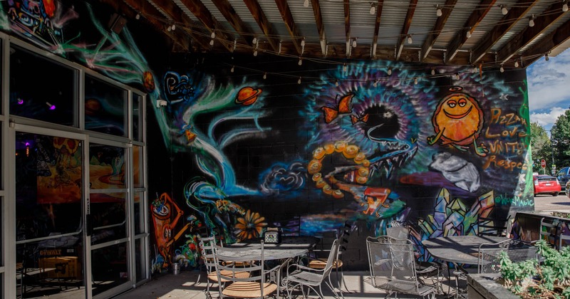 Seating area, colorful wall art