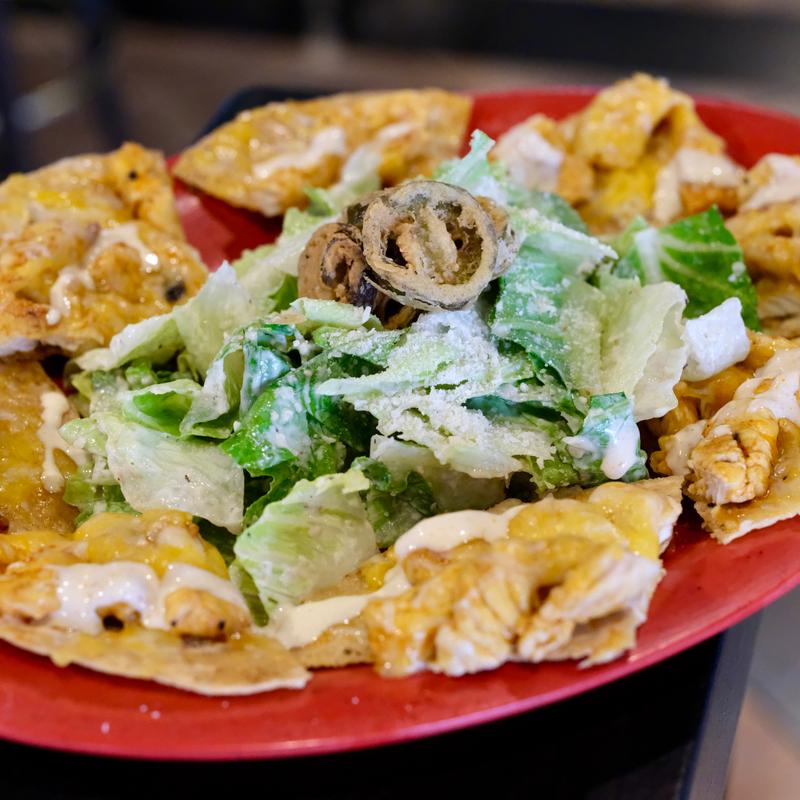 Ceasar Tostada Salad and Buffalo Chicken Tostada photo