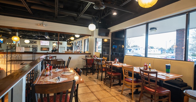 Dining area with set dining tables ready for guests