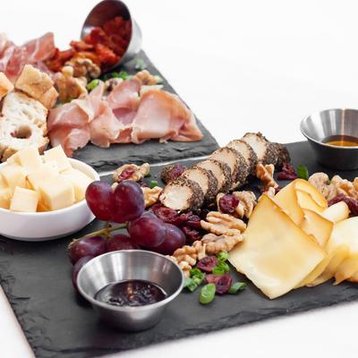 Cheese, fruit, and nut platter.