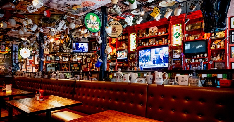 Interior, seating area with decor cups hanging from the ceiling