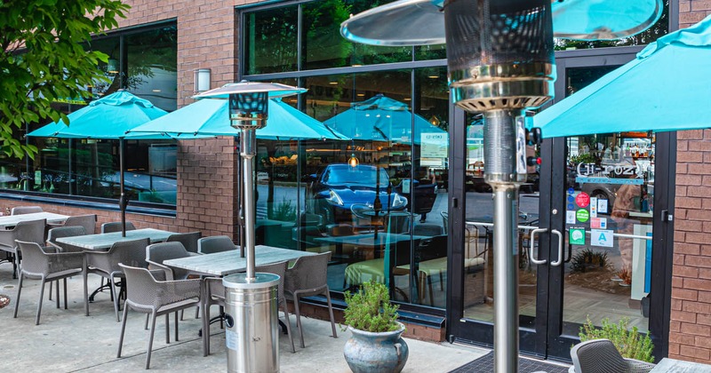 Exterior, patio, tables and seats with parasols
