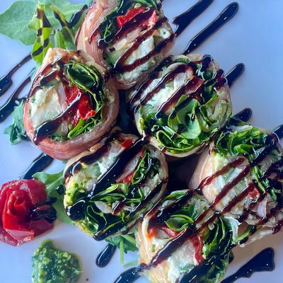 Neighborhood Roll with prosciutto, ricotta, arugula, roasted peppers and balsamic glaze.