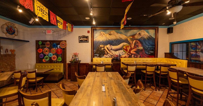 Interior, dining area with art on the walls