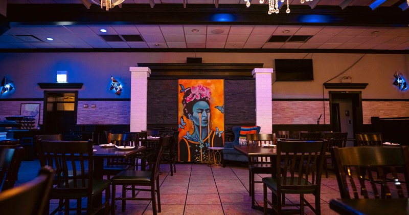 Interior, seating area, painting of Frida Kahlo