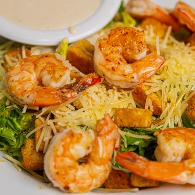 Shrimp Caesar salad, close up.