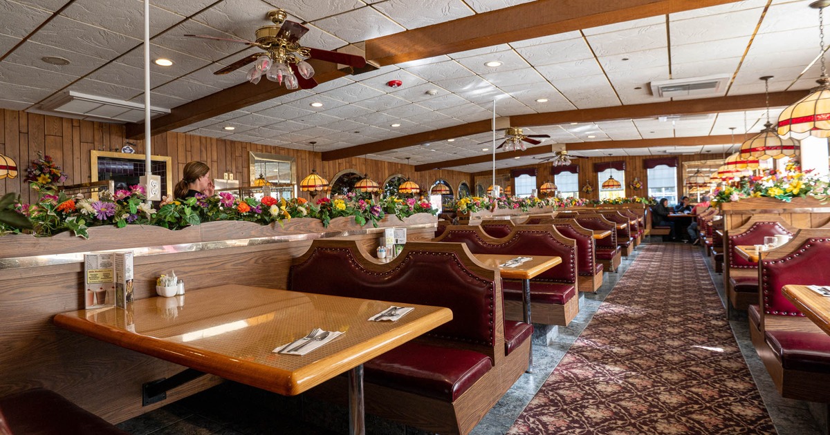 Interior, tables, and red leather seating booths