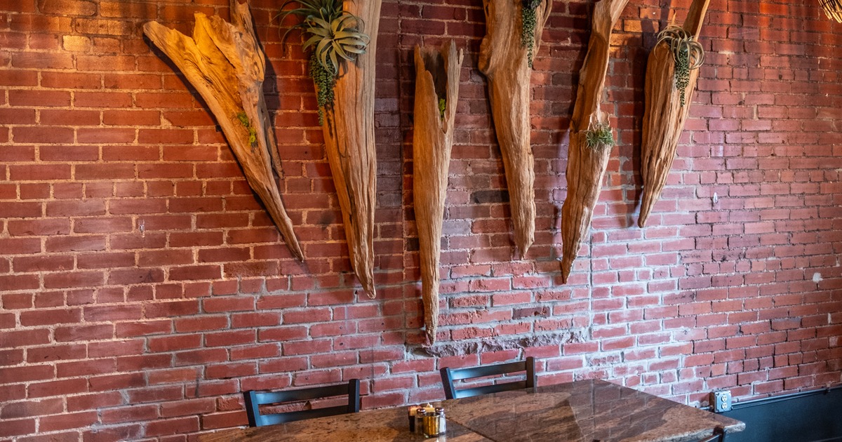 Diner table by the decorated wall