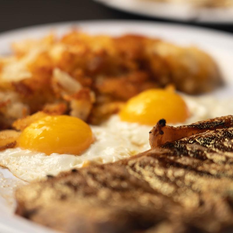 8 oz. Angus NY  Strip Steak  & Eggs* photo