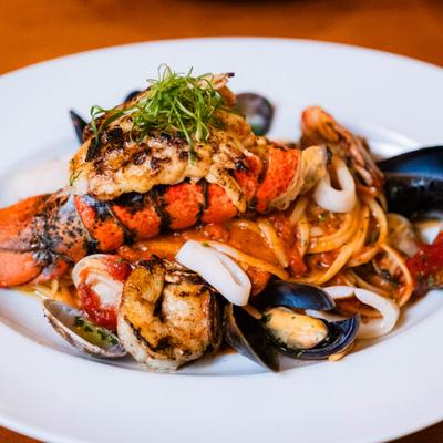 Seafood pasta with lobster, shrimp, and mussels.