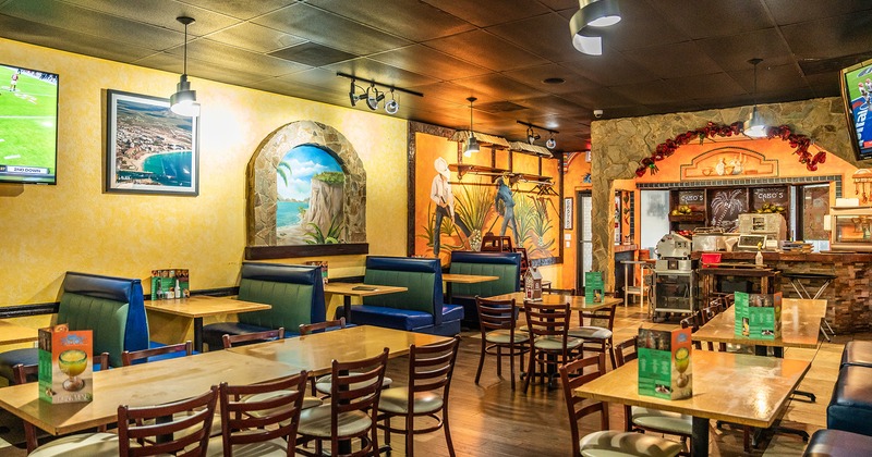 Restaurant interior, dining area with dining tables and booths