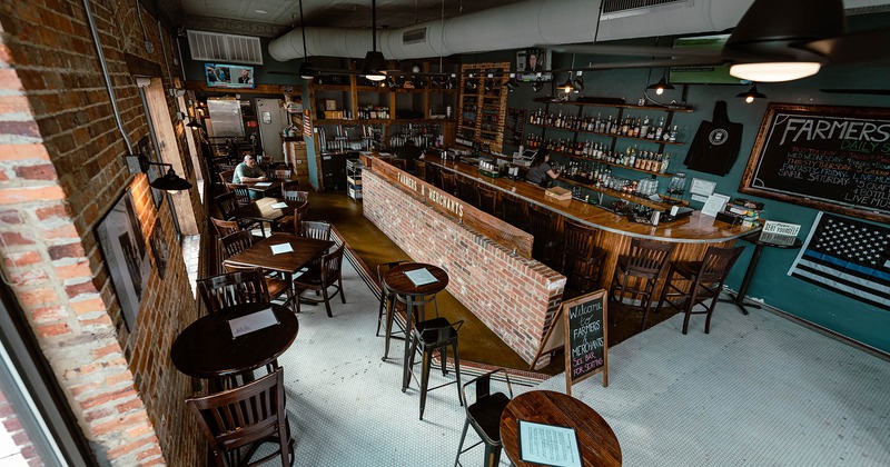 Wide shot of restaurant interior, bar area