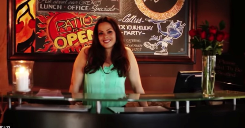 Dining area on the right, and the bar with barstools on the left.