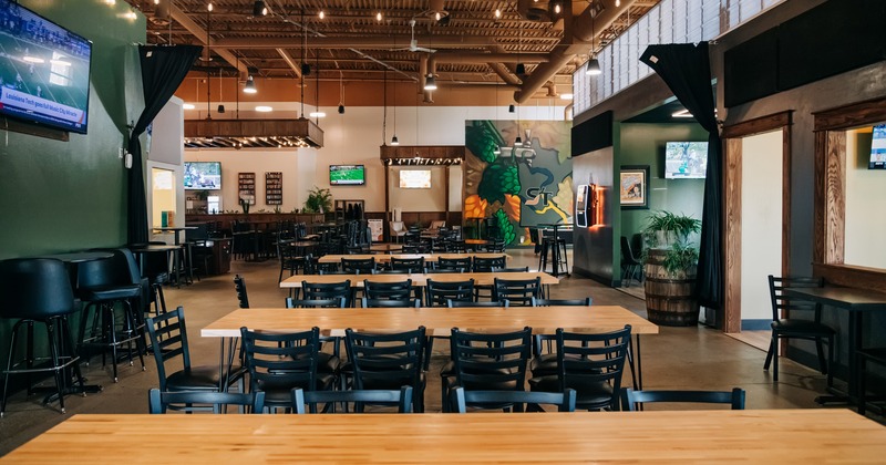 Seating space with wooden tables and chairs
