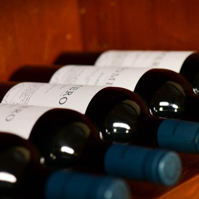 Wine rack bottles, close up.