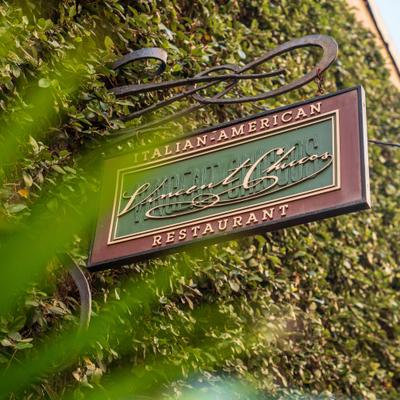 Exterior,  the sign for Vincent Chicco's.