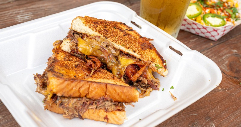 A served Brisket Grilled Cheese meal