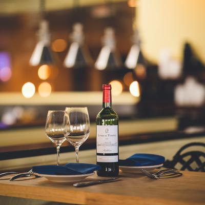 Indoor dining area, table settings.
