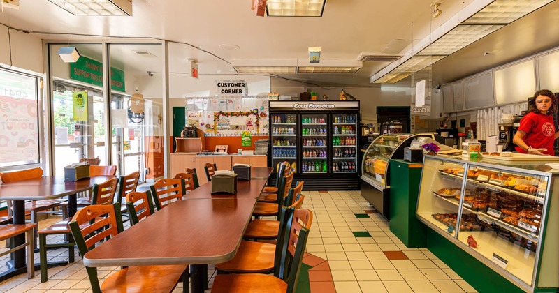 Interior, seating area, customer corner and donut corner