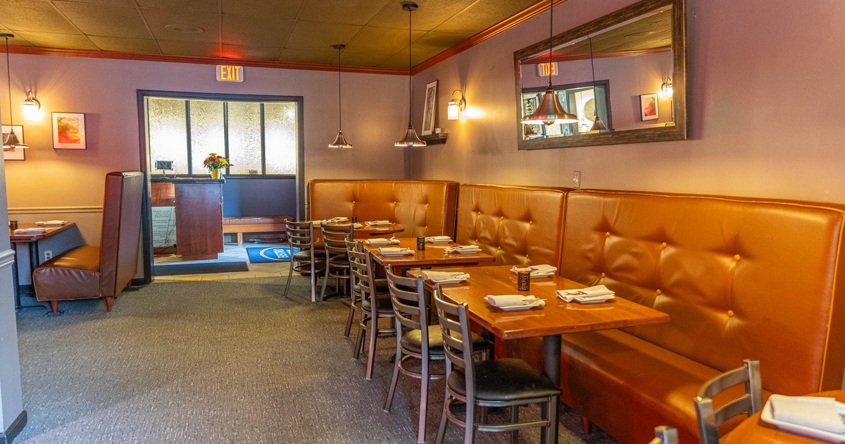Interior, tables, chairs and high back benches