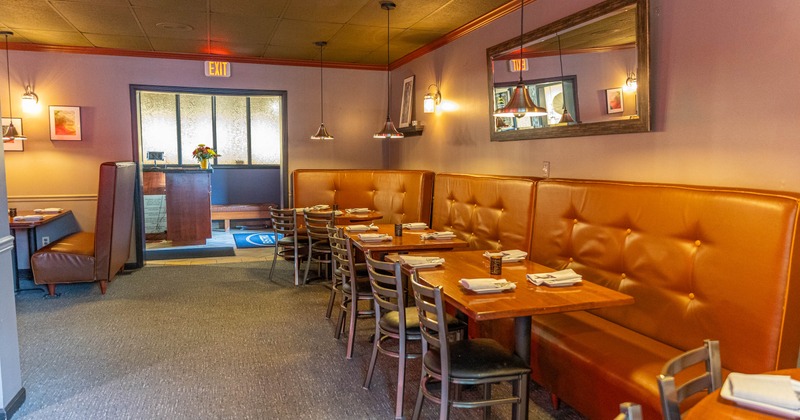 Interior, tables, chairs and high back benches