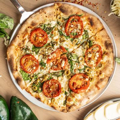 A whole pizza, top view.